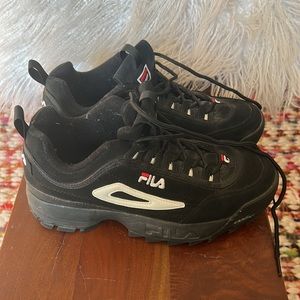 Fila black tennis shoes. Size 8.5, but run large. Easily size 9